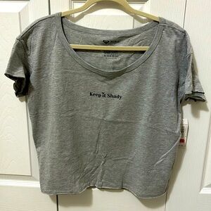 NWT Roxy T-shirt. Sz large. Grey with black lettering. 2 sided. So cute!